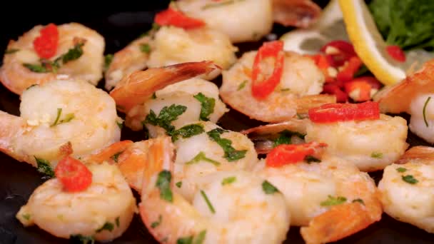 Cooked Grilled Shrimps Lemon Slice Chilli Pepper Parsley Rotating Black — Stock Video