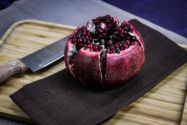 Open Pomegranate Fruit Divided Five Parts Held Together Napkin Cloth — Stock Photo, Image