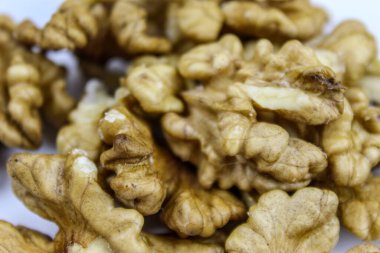 Ceviz çekirdeği yakından geliyor. Meyve fıstığı. Ceviz meyvesi. Gıda arkaplanı.