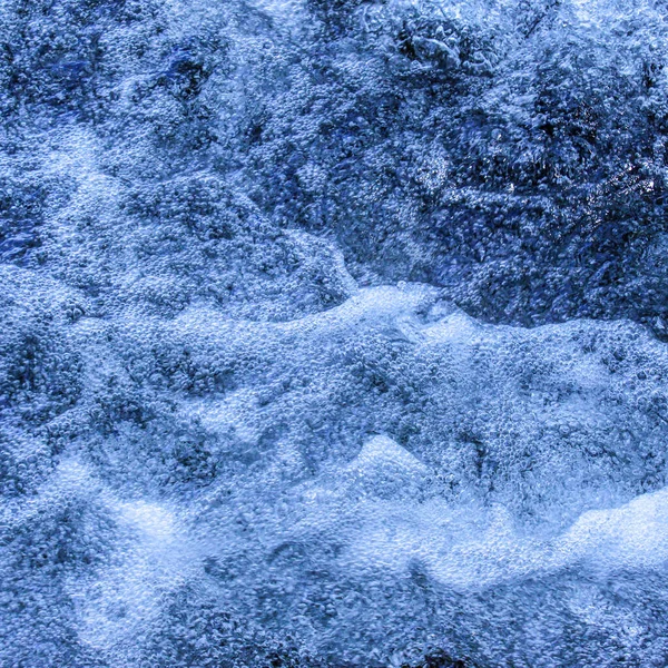 Water. Water background. Foam water. Close up. Top view.