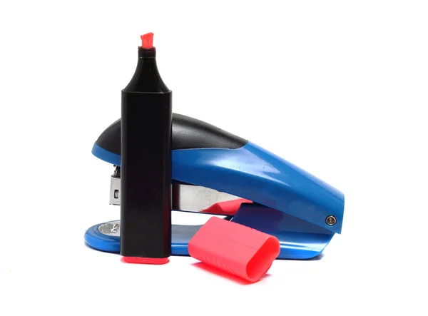 Large office stapler and a marker on a white background — Stock Photo, Image