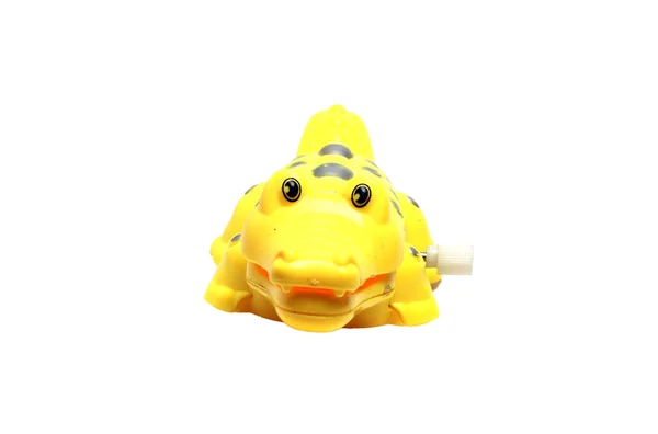 Beyaz zemin üzerine sarı timsah oyuncak — Stok fotoğraf