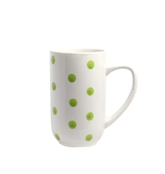 Alta xícara branca de bolinhas verdes — Fotografia de Stock