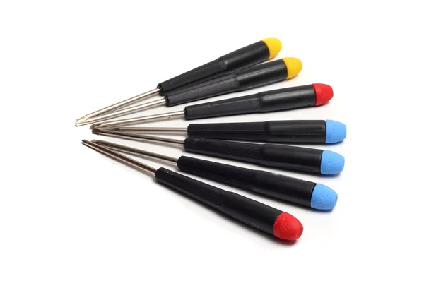 Seven screwdrivers with colorful handles — Stock Photo, Image