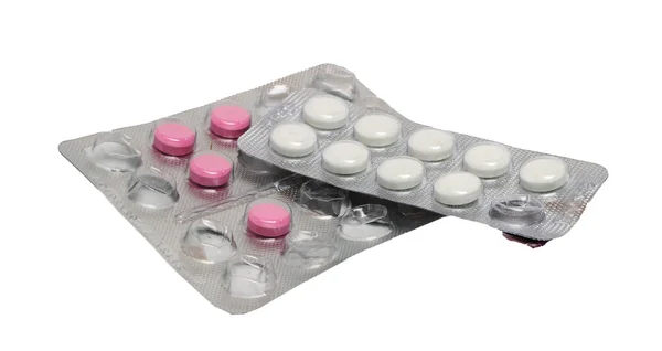 Две упаковки разных таблеток — стоковое фото