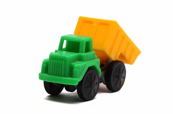 Kleurrijke speelgoed vrachtwagen op een witte achtergrond close-up — Stockfoto