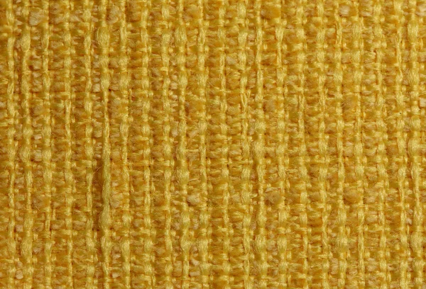 Texture de tissu jaune photographié de près — Photo