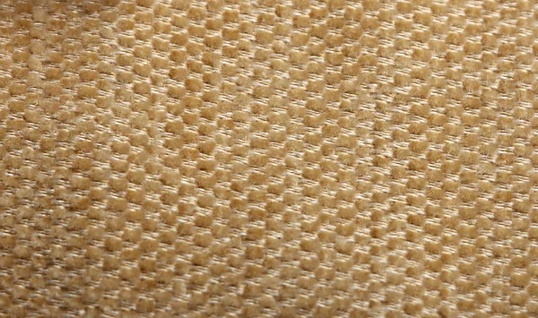 Texture de tissu jaune photographié de près — Photo