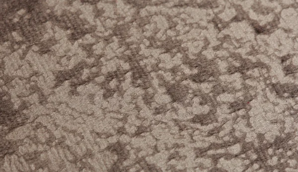 Текстура серой ткани сфотографирована вблизи — стоковое фото