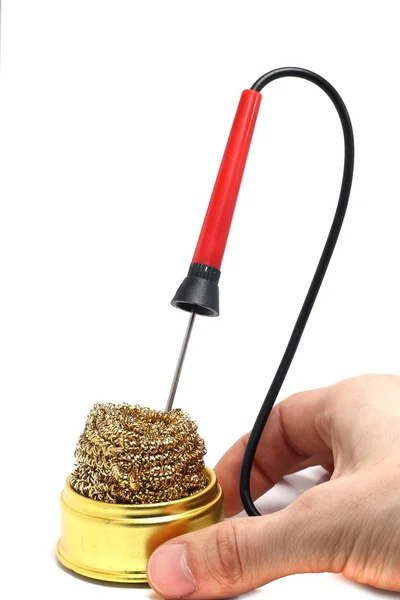 Small soldering iron in his hand on a white background — Stock Photo, Image