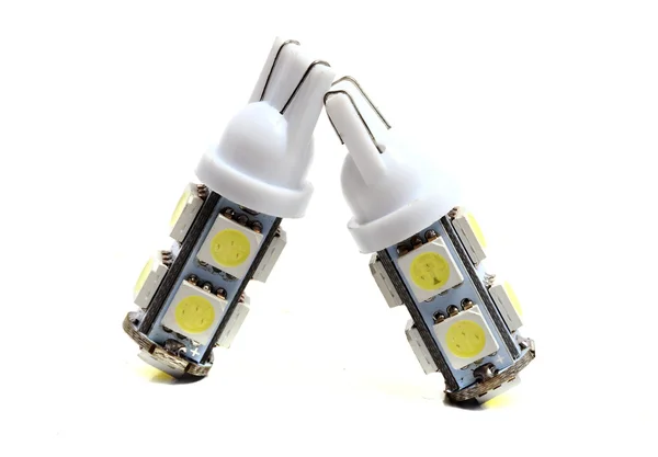 Pequenas lâmpadas LED em um fundo branco — Fotografia de Stock