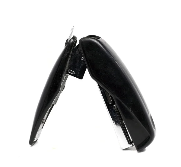 Old dusty black office stapler on a white background — Stock Photo, Image
