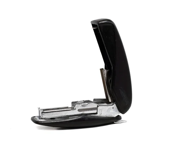 Old dusty black office stapler on a white background — Stock Photo, Image