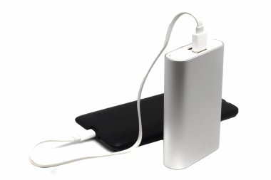 dusty mobile phone and an external battery on a white background clipart