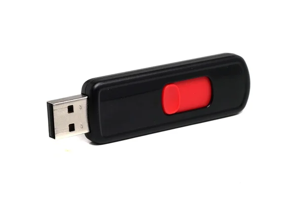 Unidad flash USB negro sobre un fondo blanco —  Fotos de Stock