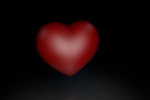 Czerwone serce na czarnym tle — Zdjęcie stockowe