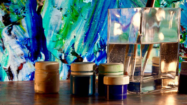 art brushes and paints . art painting . color background