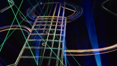 Duvar kağıdı. Renkli neon arkaplan. Neon ışığı gitarı 