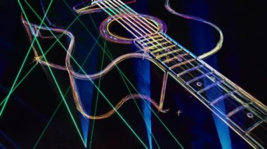 Duvar kağıdı. Renkli neon arkaplan. Neon ışığı gitarı 