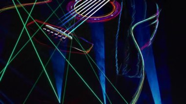 Duvar kağıdı. Renkli neon arkaplan. Neon ışığı gitarı 