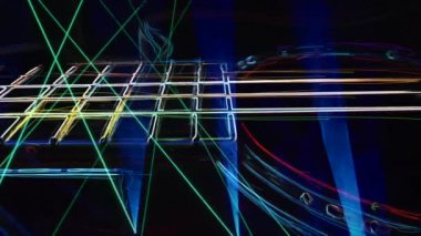 Duvar kağıdı. Renkli neon arkaplan. Neon ışığı gitarı 