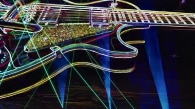 Duvar kağıdı. Renkli neon arkaplan. Neon ışığı gitarı 