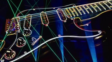Duvar kağıdı. Renkli neon arkaplan. Neon ışığı gitarı 
