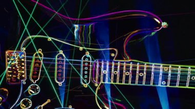 Duvar kağıdı. Renkli neon arkaplan. Neon ışığı gitarı 