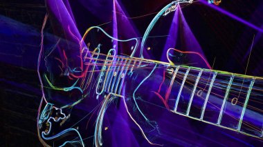 Duvar kağıdı. Renkli neon arkaplan. Neon ışığı gitarı