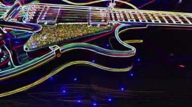 Duvar kağıdı. Renkli neon arkaplan. Neon ışığı gitarı