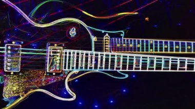 Duvar kağıdı. Renkli neon arkaplan. Neon ışığı gitarı