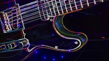 Duvar kağıdı. Renkli neon arkaplan. Neon ışığı gitarı 