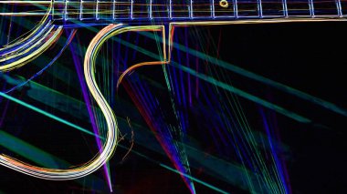 Duvar kağıdı. Renkli neon arkaplan. Neon ışığı gitarı 