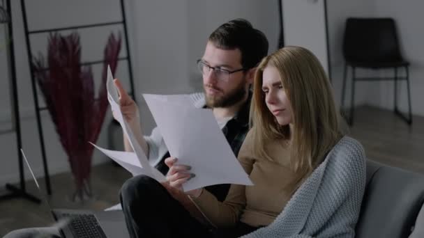 Young Couple Manages Finances Laptop Looking Bank Accounts Living Room — Stock Video
