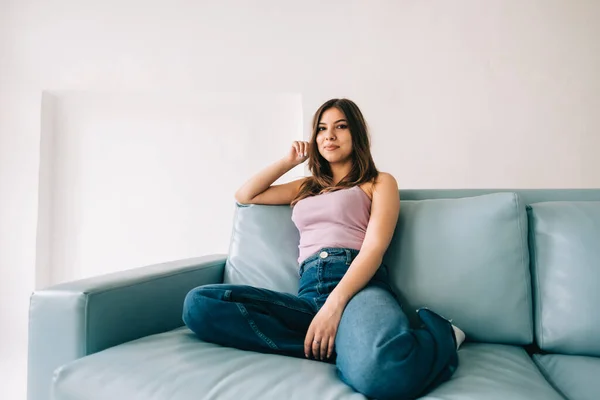 Young Calm Caucasian Woman Relaxing Sitting Sofa Modern Living Room — Stock Photo, Image