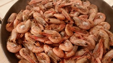 Shrimps fried on a pan