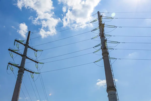 High voltage electric industrial gear on a background of blue sky