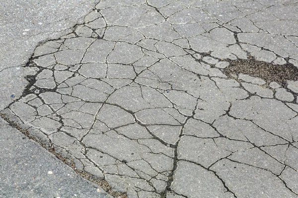 Textured Surface Muddy Asphalt Road Chips Cracks Scratches — Stockfoto