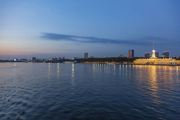 Moscow, Russia - September 12, 2021: Brightly illuminated evening building of the Northern River Station. Built in 1937. Opened after reconstruction in 2020