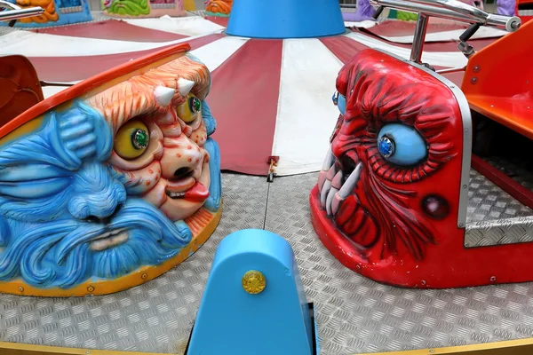 Evil cabins on the carousel — Stock Photo, Image