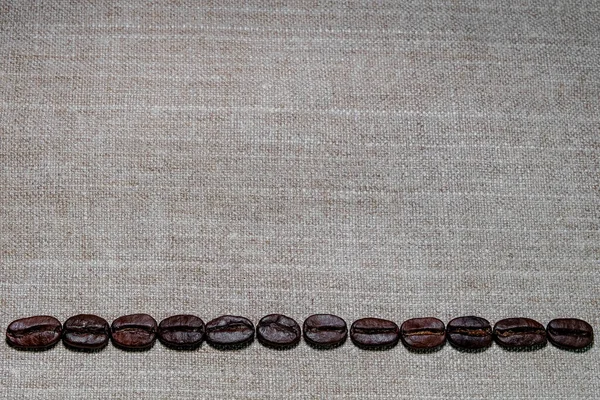 Beautiful Flat Grains Black Coffee Background Coarse Linen Cloth — Stock Photo, Image