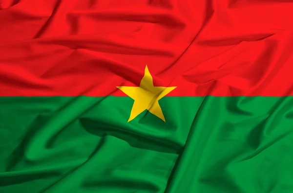 Burkina Faso  flag on a silk drape waving — Stock Photo, Image