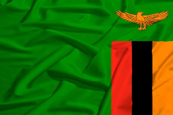 Zambia flagga på en siden drapera vinka — Stockfoto
