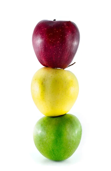 Three ripe colorful apples stacked as a trafficlight — Stock Photo, Image