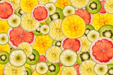 mixed colorful sliced fruits  background back lighted  clipart