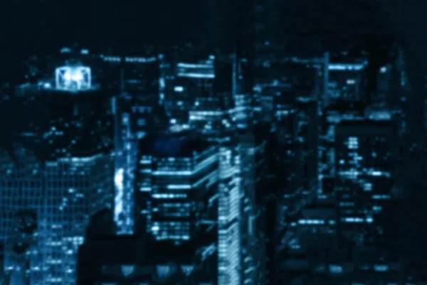 Opzettelijk onscherpe achtergrond van een nacht stad blu afgezwakt — Stockfoto