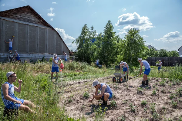 Man of all trades in the garden — Stock Photo, Image