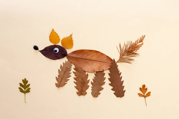  funny character made of dry leaves, craft leaf autumn, nature art,