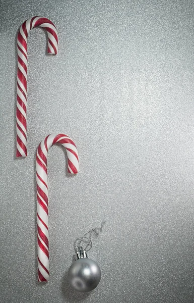 Candy Canes Christmas Ball Sparkling Silver Background Selective Focus Copy — Fotografia de Stock