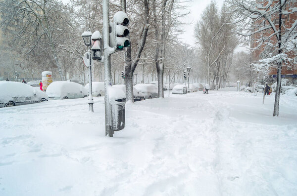 MADRID, SPAIN - JANUARY 9, 2021: Streets of Madrid blanketed with the heaviest snowfall in 50 years, during Storm Filomena